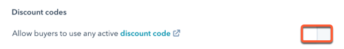HubSpot payment link settings screen with the 'Discount codes' toggle switch highlighted and turned on.