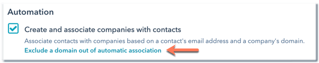 A HubSpot automation setting for 'Create and associate companies with contacts'. The setting is on, and an orange arrow points to a link that says 'Exclude a domain out of automatic association'.