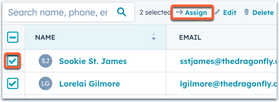 screenshot of a table of contacts. Sookie St. James is selected and an "assign" button is highlighted at the top of the table.