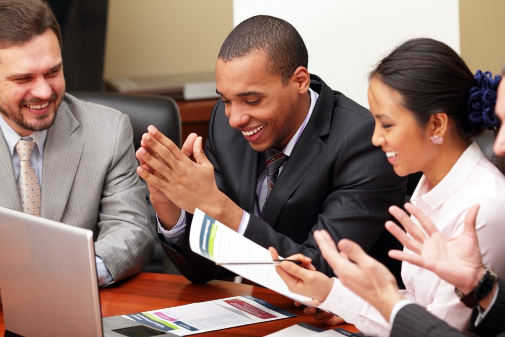 Multi ethnic business team at a meeting. Interacting. Focus on african-american man-1