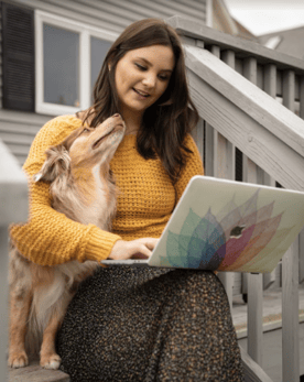 HubSpot employee working at home with dog