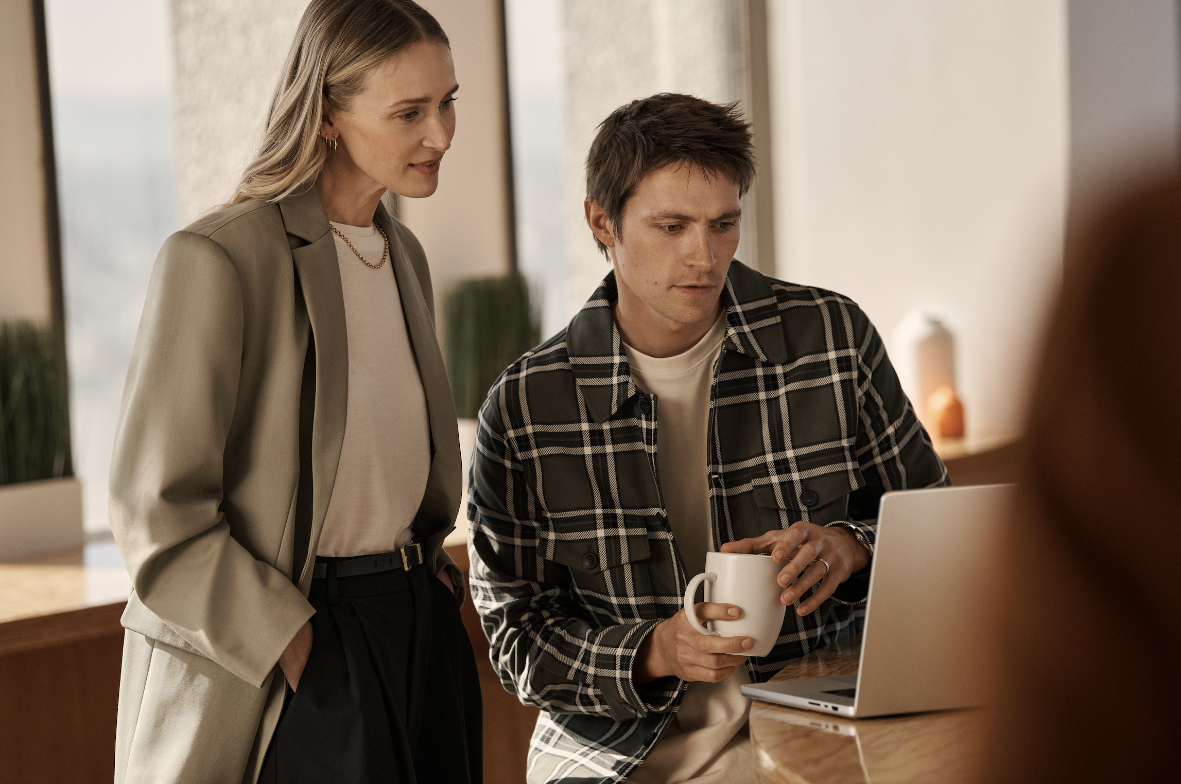 woman+man looking at computer