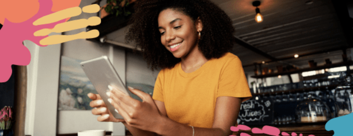 a black entrepreneur develops a social media strategy on a smartphone