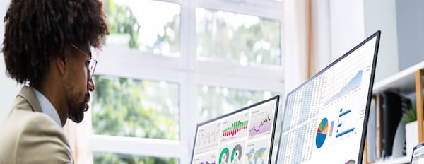 a person looks at analytics to boost their analytical skills