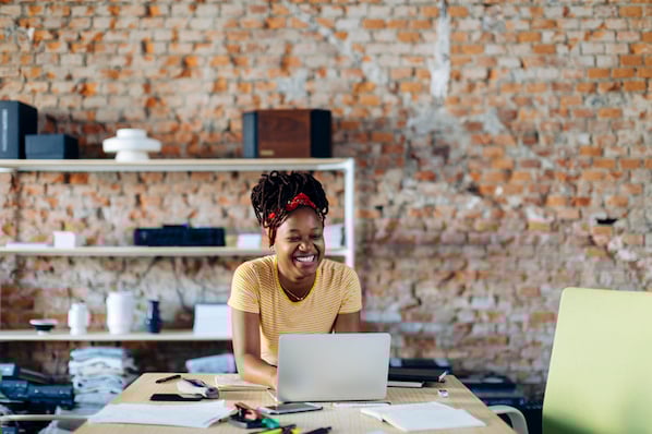 black woman owning a business and using black-owned business marketing strategies to grow her brand.
