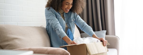 consumer opens package from try-before-you-buy brand