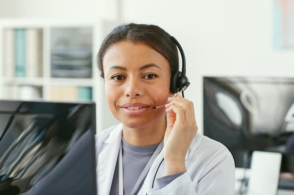 Customer support rep with a headset.