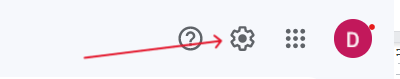 Screenshot showing an arrow pointing to the settings (gear) icon.