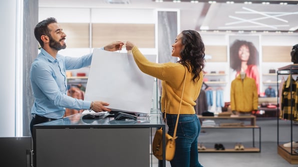 retail business making a sale for loyal customer using customer retention strategies that work