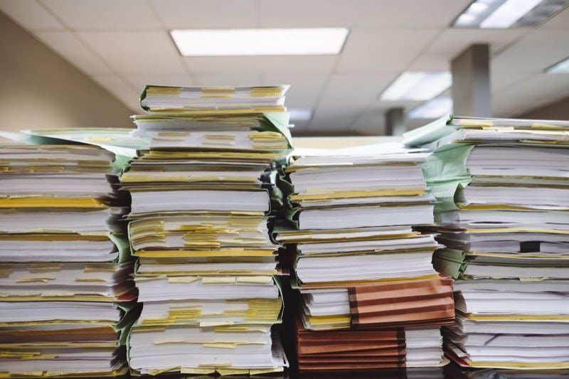 stack-of-paperwork-unsplash