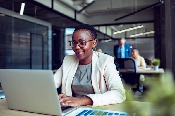 woman working on computer privacy-first company-1