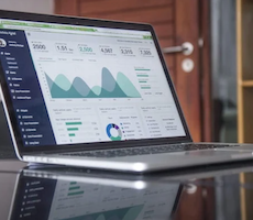 a laptop with data displayed on it