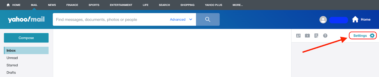 Screenshot of Yahoo Mail account with red arrow pointing to settings.