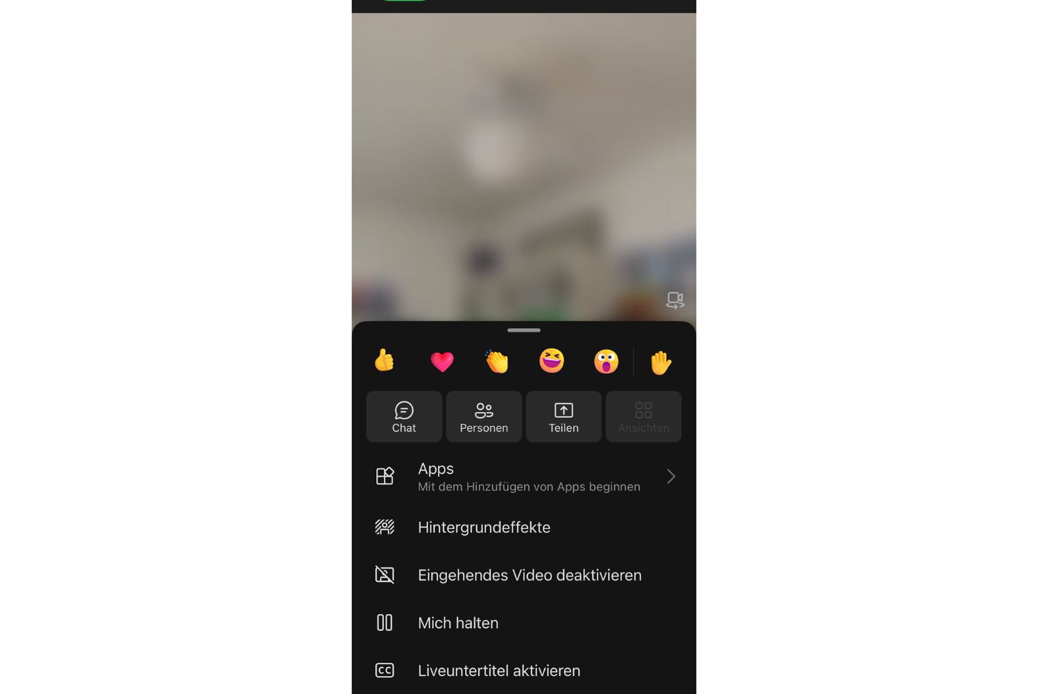 Screenshot, wie man Teams-Hintergrund ändert, während man sich mit Smartphone in Besprechung befindet