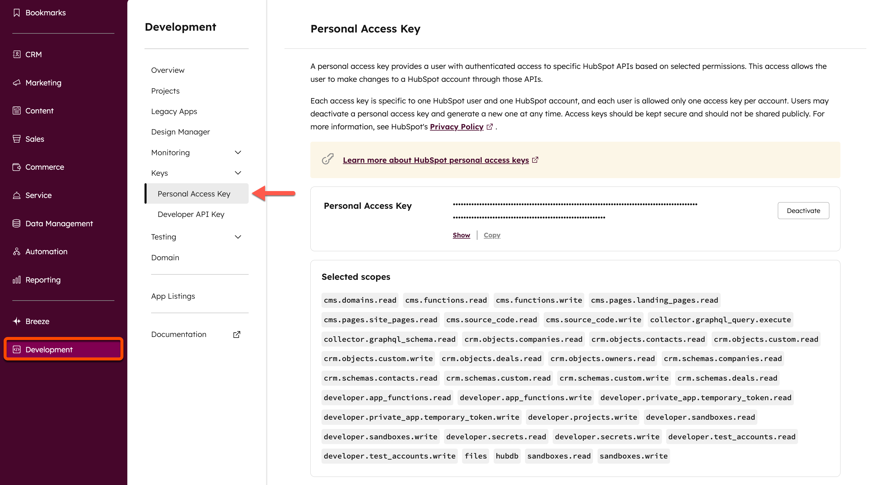 Screenshot showing how to navigate to the personal access key page in HubSpot