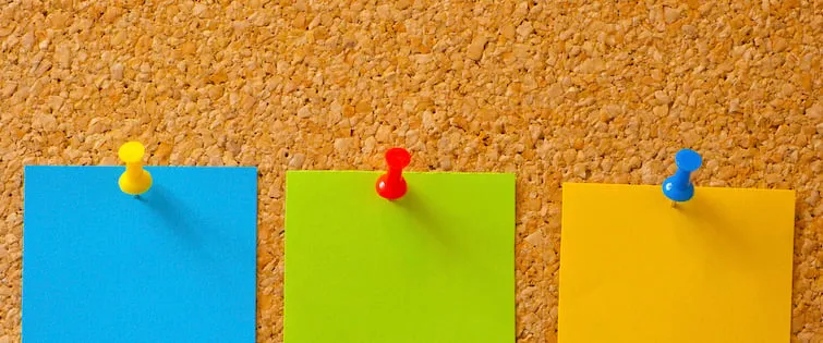 sticky notes on a cork board symbolizing the Pin It Generator tool